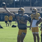 Sam Leavitt #10 practices ahead of the tilt between Texas Tech on Saturday