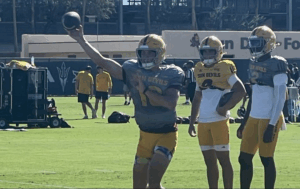 Sam Leavitt #10 practices ahead of the tilt between Texas Tech on Saturday