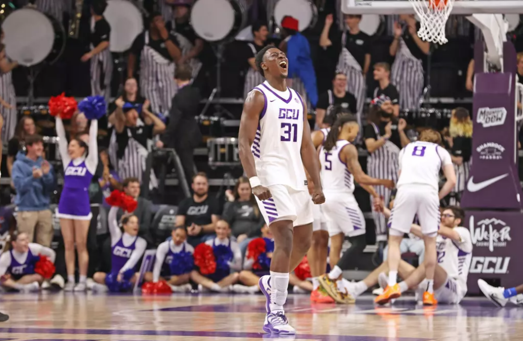 image » Greenville Sports Media GCU forward Nana Owusu-Anane #31 celebrates a drawn charge from fellow big man Wilhelm Bridenbach #32 for the Lopes. Photo Credit: David Kadlubowski/GCU Athletics
