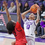 Chloe Mann #0 goes hard on a layup vs SDSU (Photo Credit: David Kadlubowski/GCU Athletics)