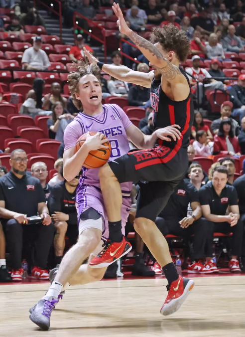 GCU guard Dusty Stromer drives the lane in late loss vs UNLV.