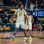 Bucs battle it out and overcome Paladins in OT, 75-71