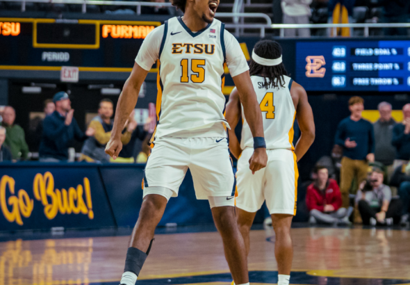 Bucs battle it out and overcome Paladins in OT, 75-71