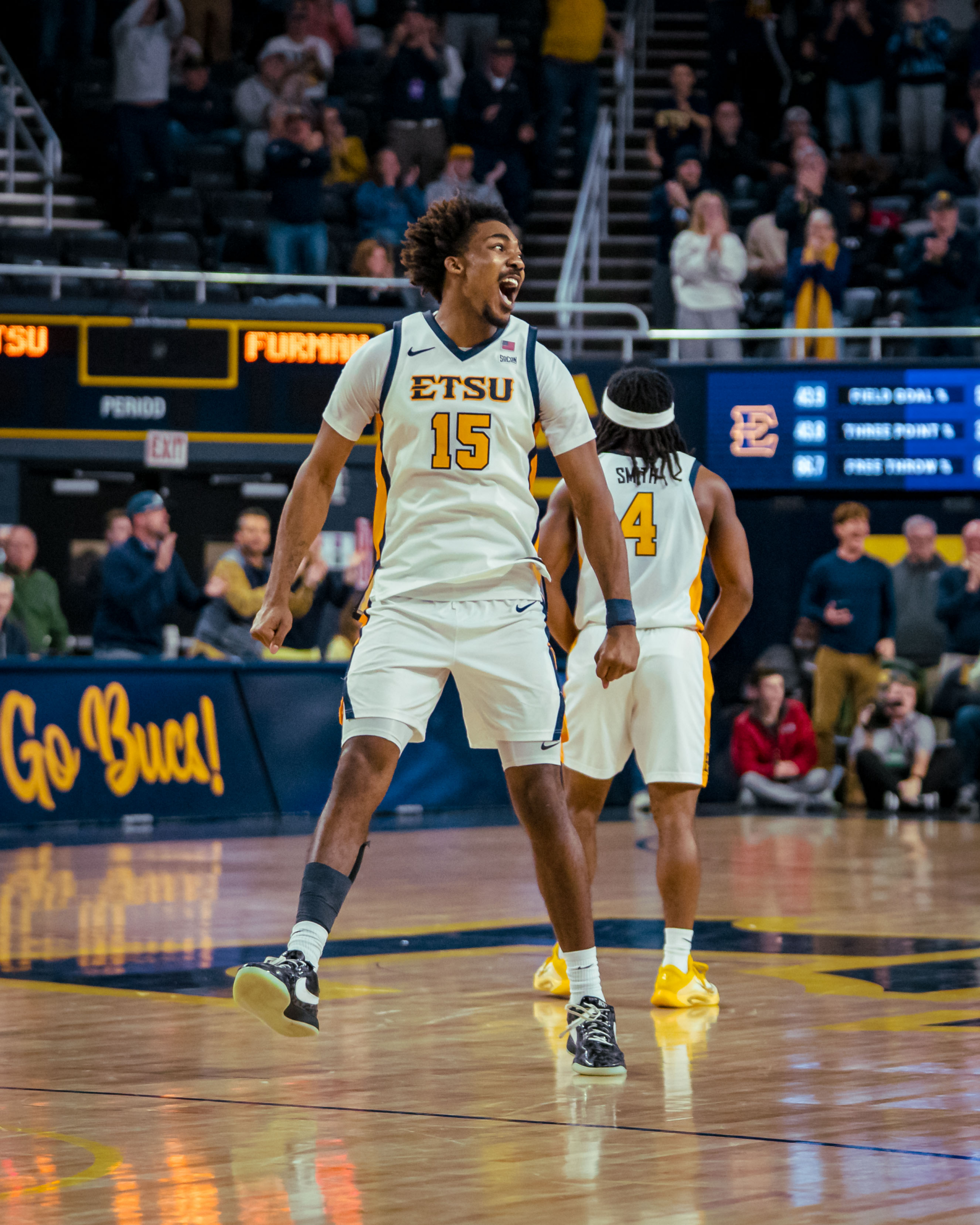 Bucs battle it out and overcome Paladins in OT, 75-71