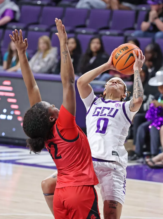 GCU Star Chloe Mann #0 drives to the basket for a big shot vs SDSU (Photo Credit: David Kadlubowski/GCU Athletics)