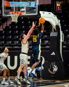 Terriers Tamed: Bucs Roll to 86-72 Victory