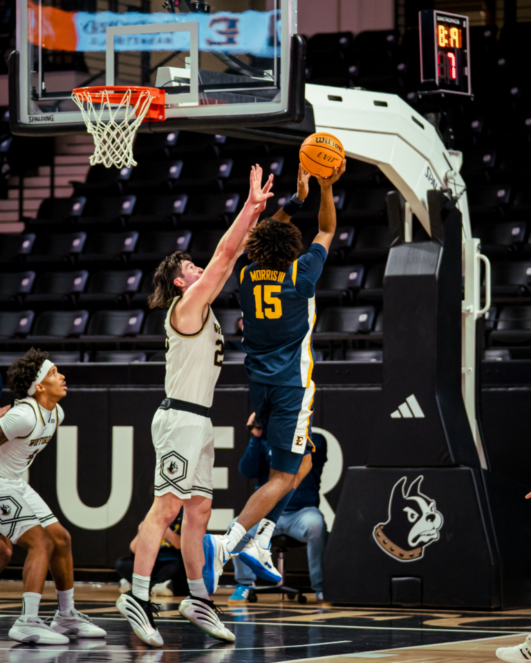 Terriers Tamed: Bucs Roll to 86-72 Victory