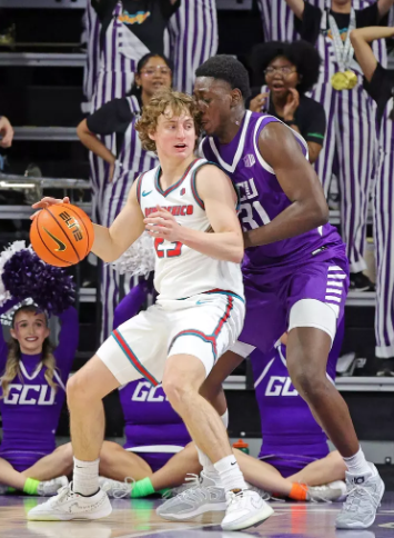 GCU Nana Owusu-Anane guarding UNM Jake Hall deep in the post after their grueling 70-64 loss on 2/11/2026