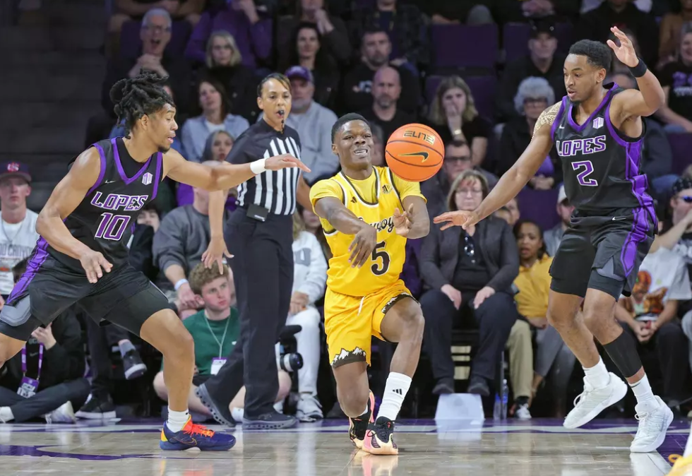 GCU #10 Jaden Henley goes for the steal vs Wyoming