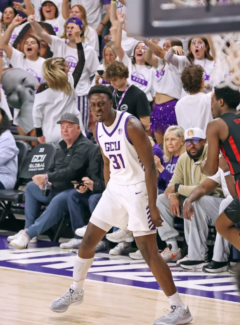 image » Greenville Sports Media GCU #31 Nana Owusu-Anane lets the fans know after massive first half tallying 8 points and 8 rebounds