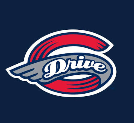 Team logo for 'Drive' featuring a gray wing across a red circular ring on a dark blue background