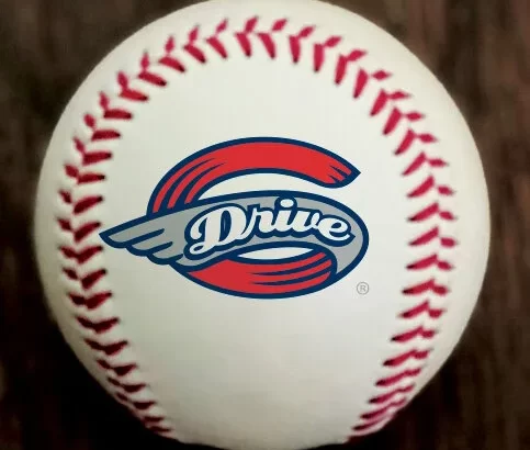 White baseball with red stitching and a blue/red 'Drive' logo at the center.