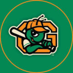 Green cartoon character wearing an orange cap, gripping a baseball bat, inside an orange 'G' on a green circular background.