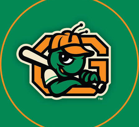 Green cartoon character wearing an orange cap, gripping a baseball bat, inside an orange 'G' on a green circular background.