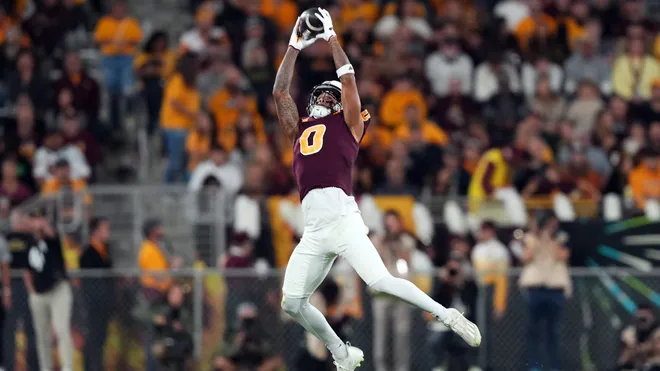 Jordyn Tyson makes a jumpIng grab at home last season for ASU