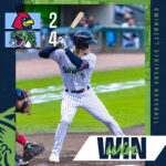 Graphic of a baseball player swinging with a 2-4 score, team logos on the left, and 'WIN' text; Northside Hospital branding at bottom-right.