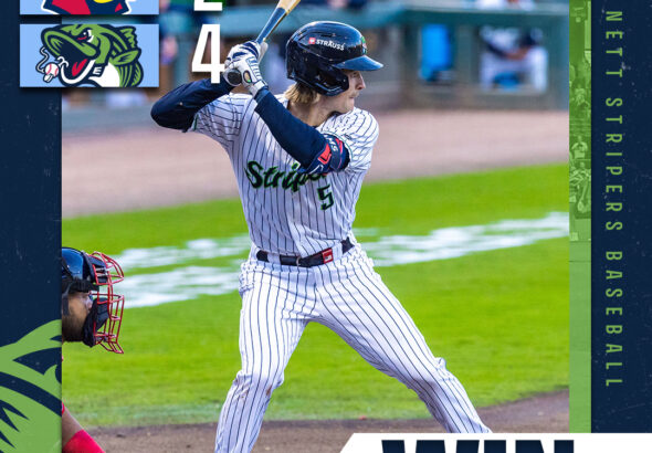 Graphic of a baseball player swinging with a 2-4 score, team logos on the left, and 'WIN' text; Northside Hospital branding at bottom-right.