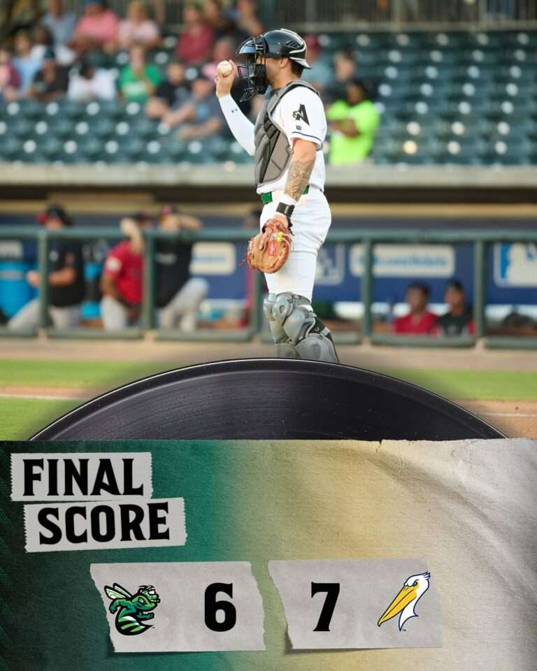 Baseball catcher in full gear standing on the field with a large 'FINAL SCORE' graphic showing 6 to 7 and team logos in the foreground.