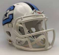 White football helmet with a blue star logo on the side and a white facemask on a neutral background.