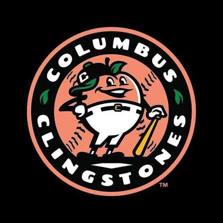 Columbus Clippers logo: a cartoon orange wearing white pants, holding a bat, inside a peach circular badge with black border and 'Columbus Clippers' text