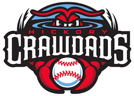 Hickory Crawdads baseball team logo showing a red crawdad gripping a baseball, with blue water details and the team name.