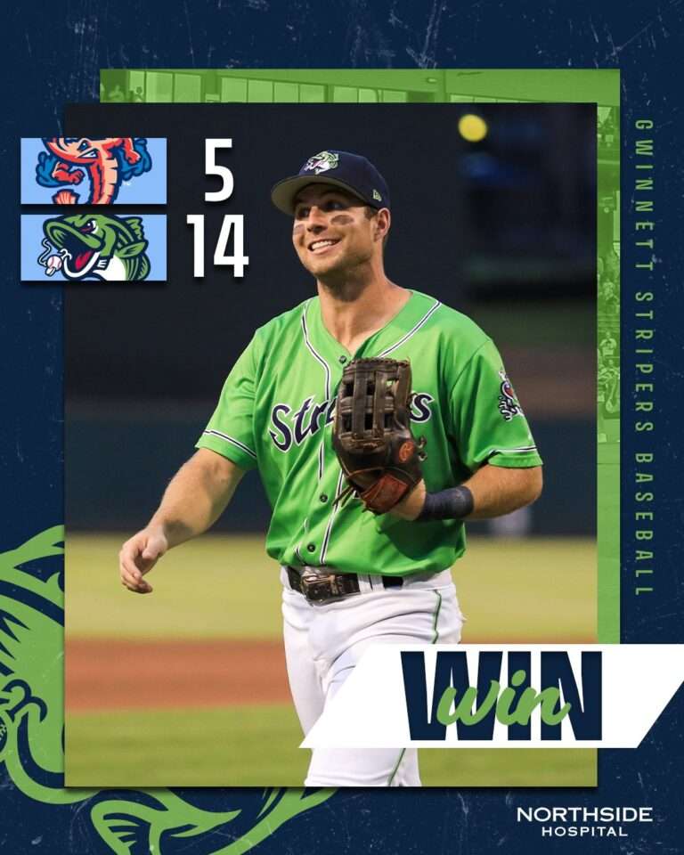 Baseball player in a green uniform with a white 'WIN' banner and score 5-14 shown on the left, promoting a win for the Northside Hospital team.