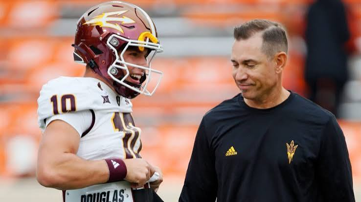 Offensive Coordinator Marcus Arroyo with Sam Leavitt before game vs Oklahoma State