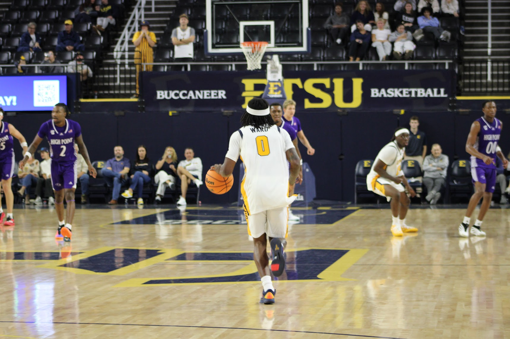 ETSU's BJ Ward taking the ball down the court.